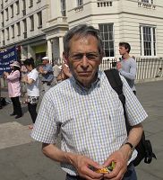 来自葡萄牙的弗朗西斯科•菲盖拉先生希望更多的中国人愿意了解真相