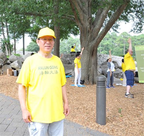 '图9:活动协调人之一的雷岳先生表示:总有一天迫害会停止'